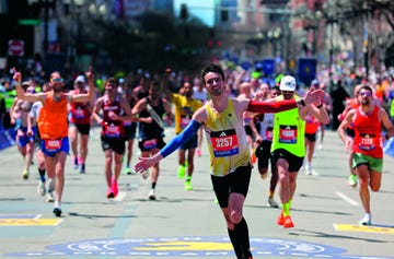 boston , ma april 15: guy jacques flies into the finish line during the 128th boston marathon. (photo by matt stone/medianews group/boston herald via getty images)