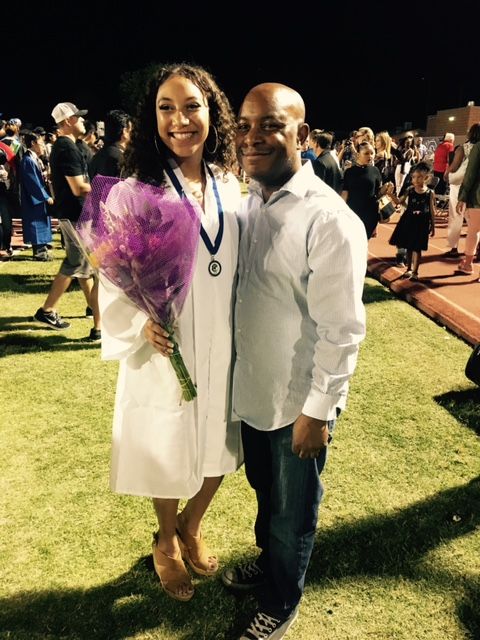 aposhian with her dad at her graduation ceremony from chandler high school in 2017