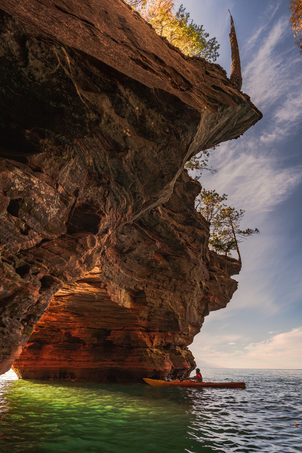 apostle island sea cave kayaker