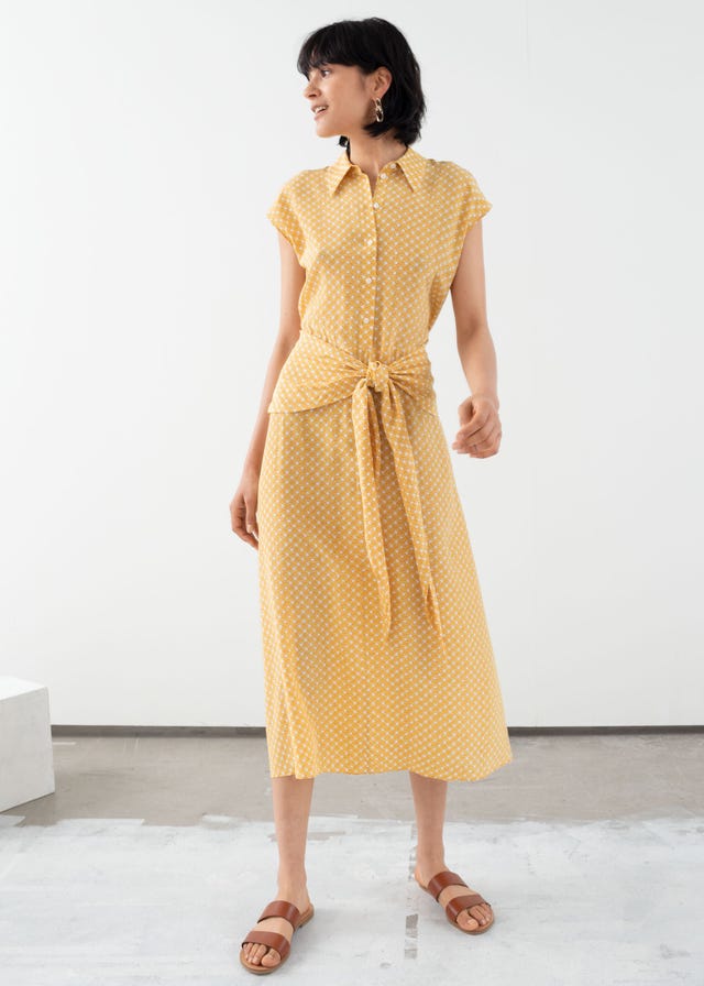Clothing, Fashion model, Dress, Day dress, Yellow, Beige, Neck, Fashion, Sleeve, Pattern, 