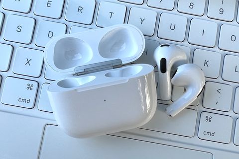 apple airpods 3rd generation on top of keyboard