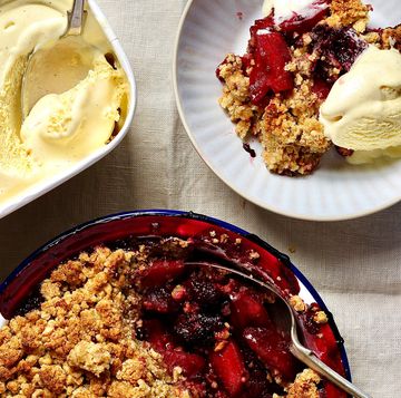 apple and blackberry crumble in a dish served with ice cream