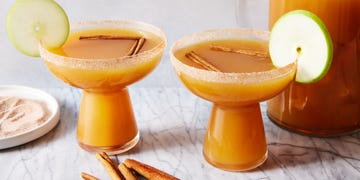 apple cider margaritas with an apple slice garnish