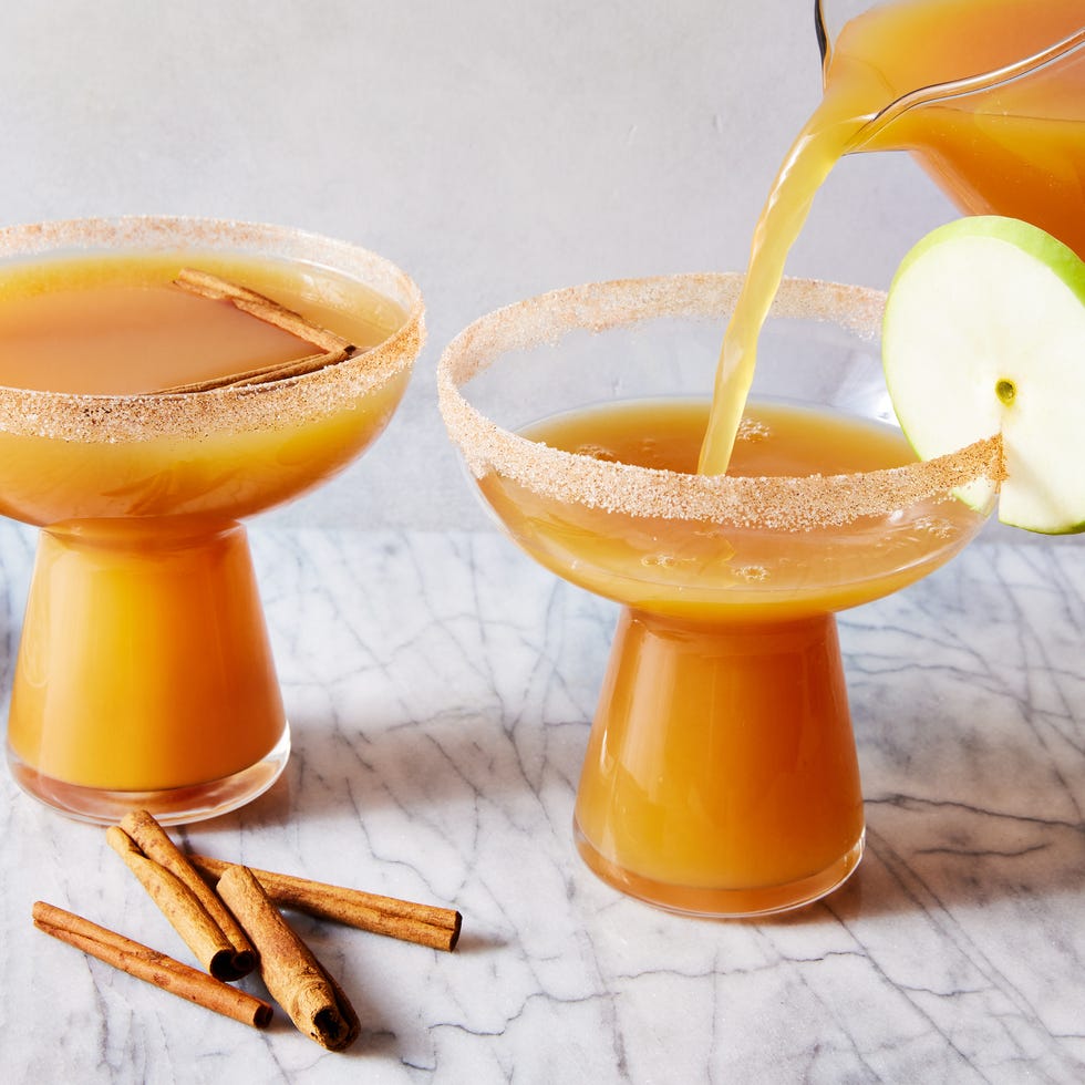 apple cider margaritas with an apple slice garnish