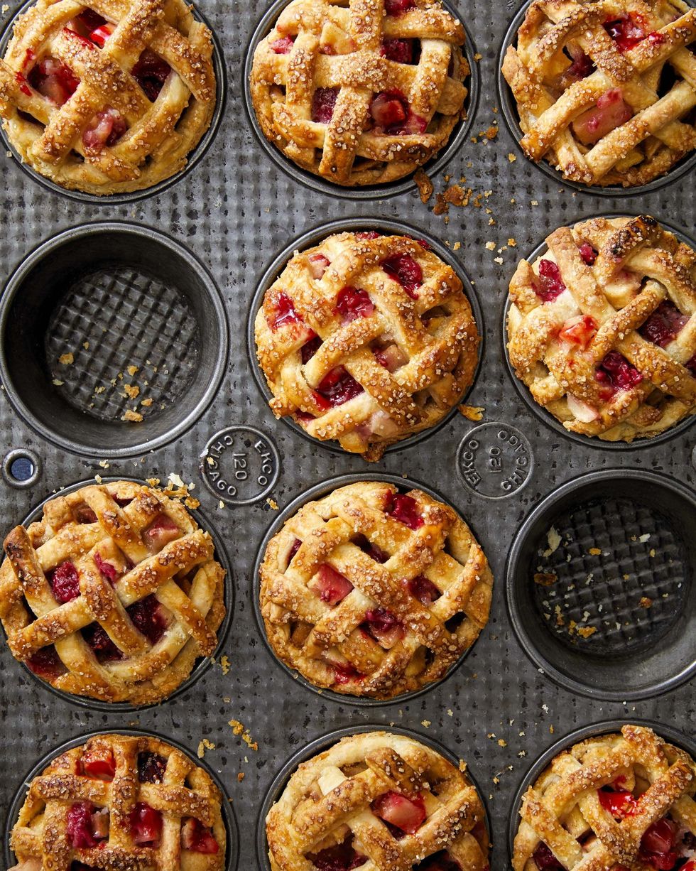mini apple and raspberry pies made in a muffin tin