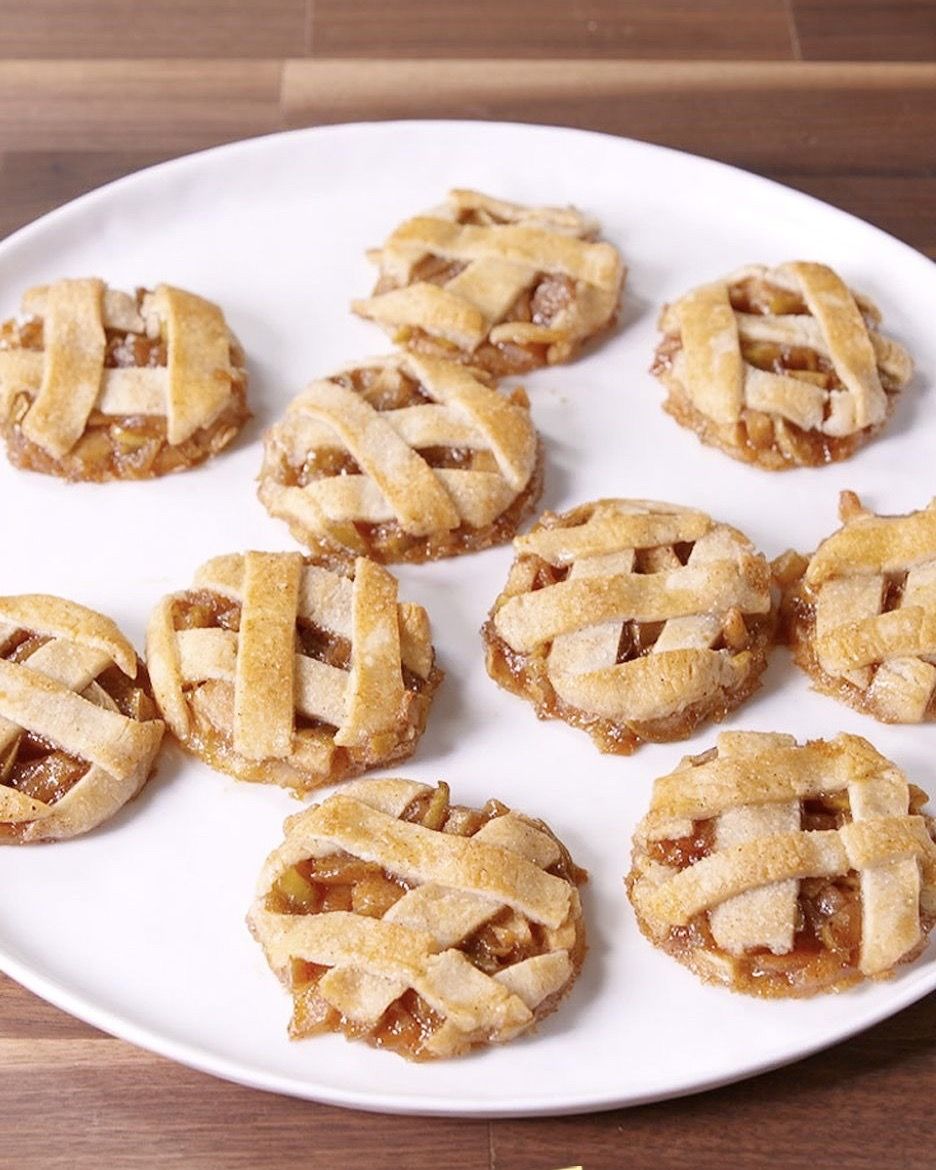 apple pie cookies with lattice tops on a white plate