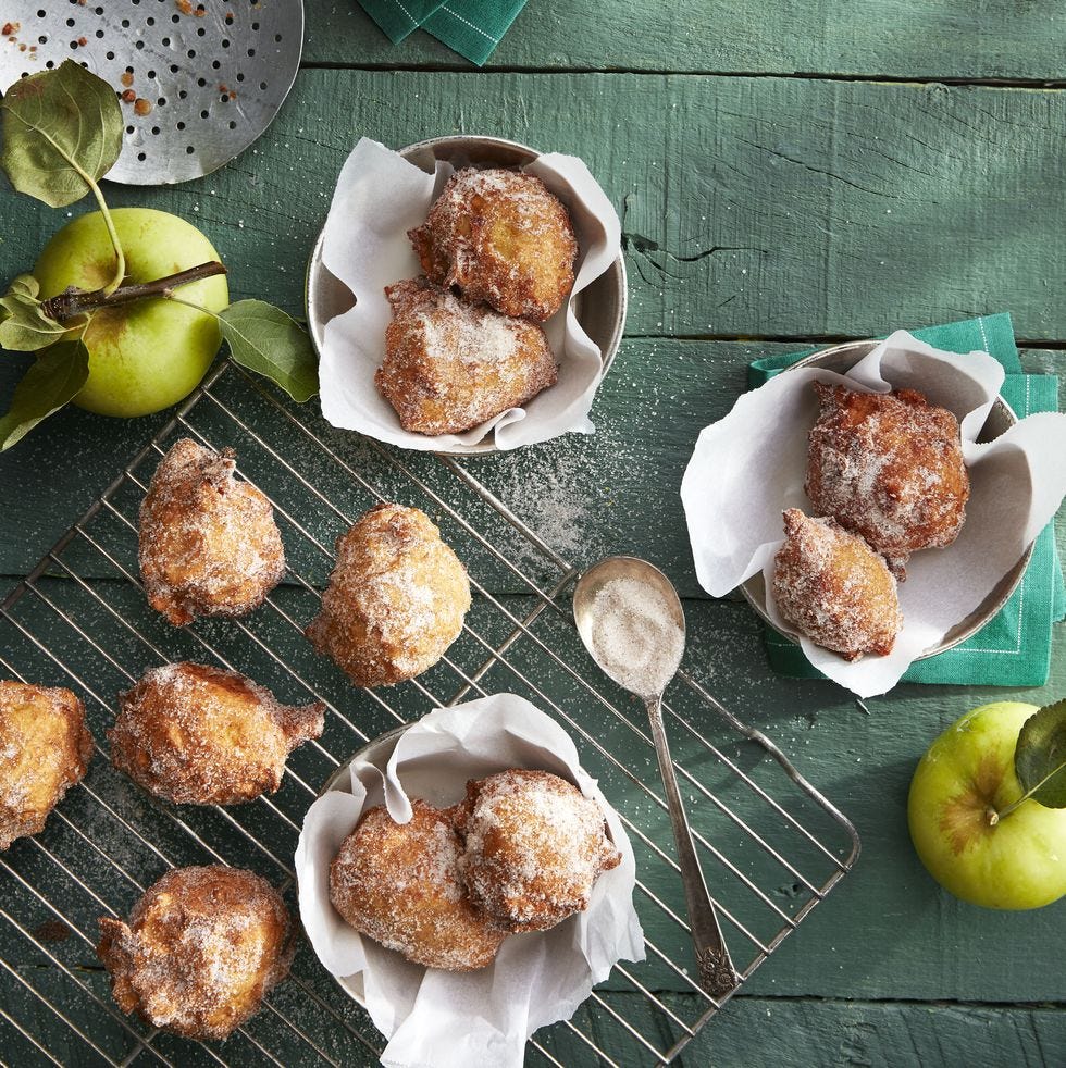 apple fritters covered in cinnamon sugar on top