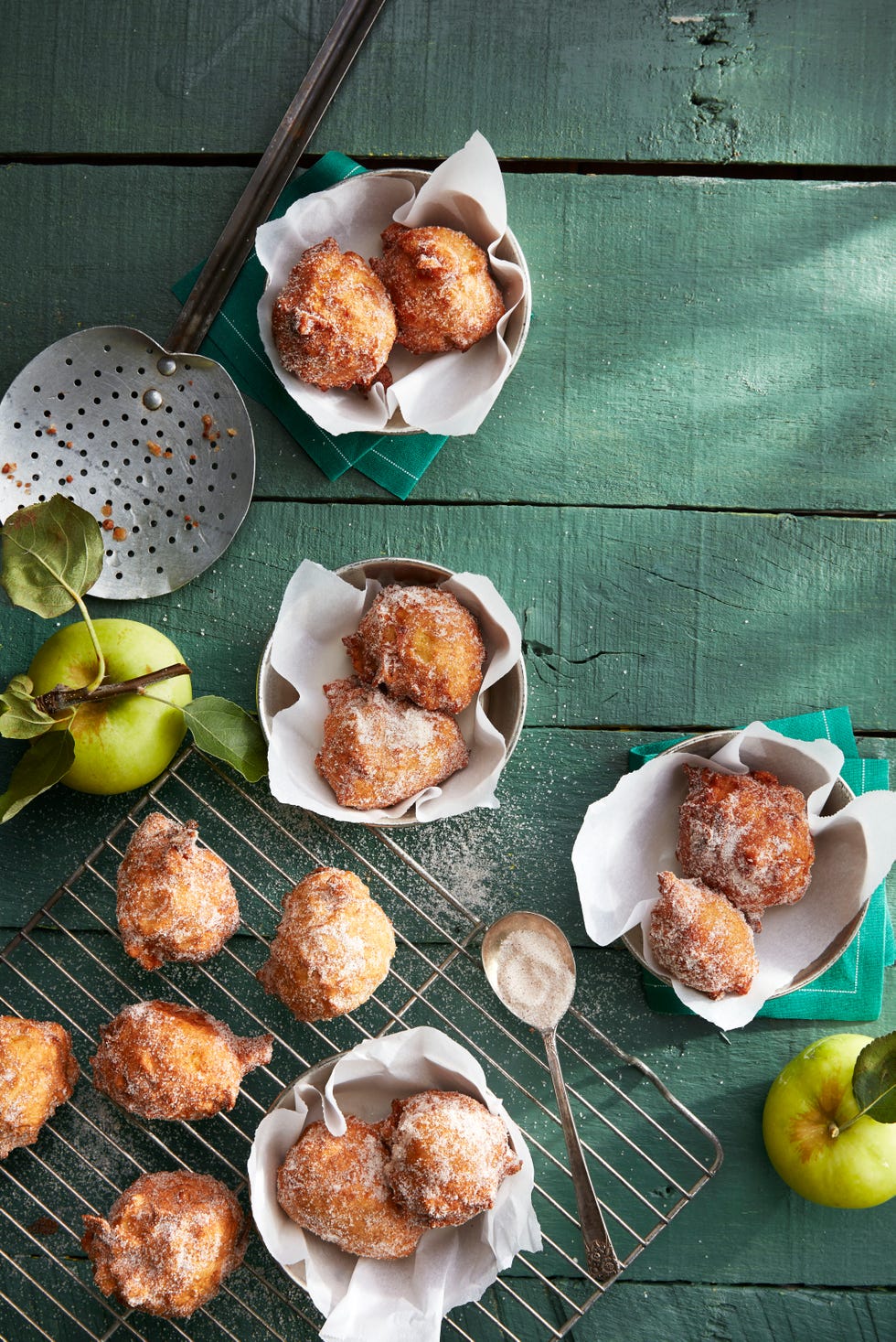 apple fritters with powdered sugar on top