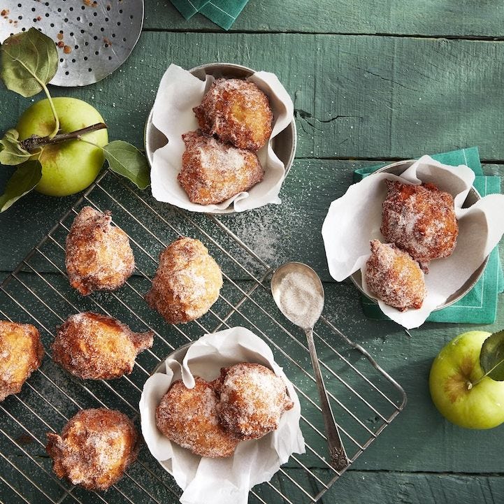 apple fritters with sprinkled sugar on top
