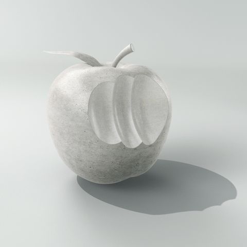 Apple made of concrete with bite
