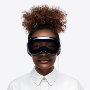 a boy wearing a virtual reality headset