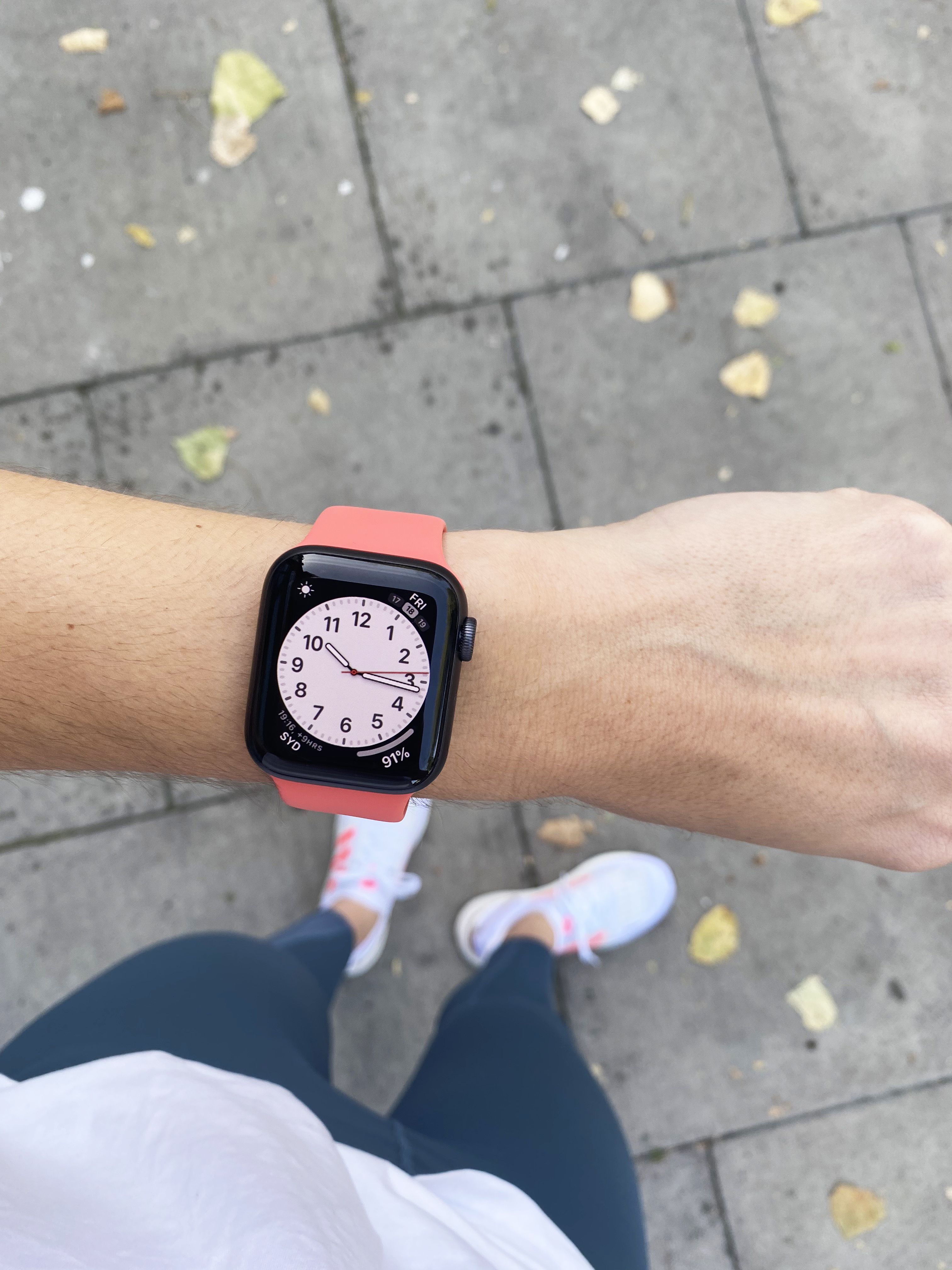 Black apple shop watch on women