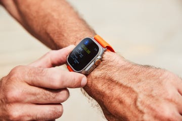 a person holding a watch