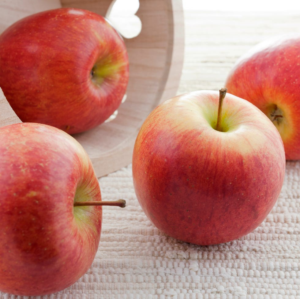 apples in wooden basket with hearts