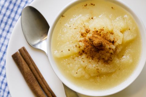applesauce with cinnamon in a white bowl viewed from above
