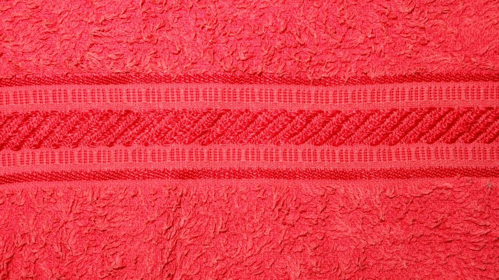 appliques and stitches on beautiful clothes form patterns on jeans, cotton, polyester, silk, denim, linen, with isolated background wallpaper textures