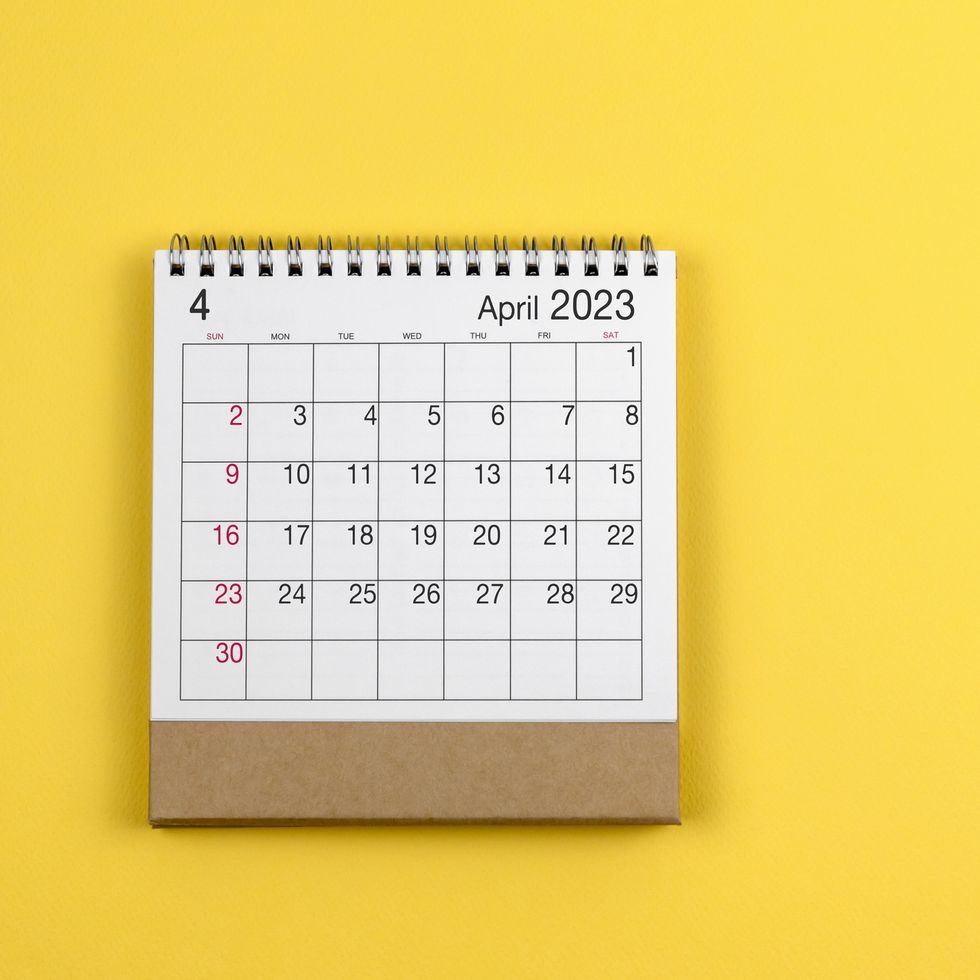 april 2023 calendar on blue background