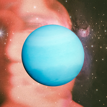 a planet in front of a silhouette of a man's face