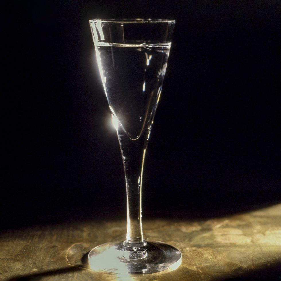 aquavit drink in glass on table