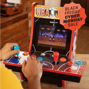 a person playing a tabletop nba jams arcade game, black friday cyber monday sale