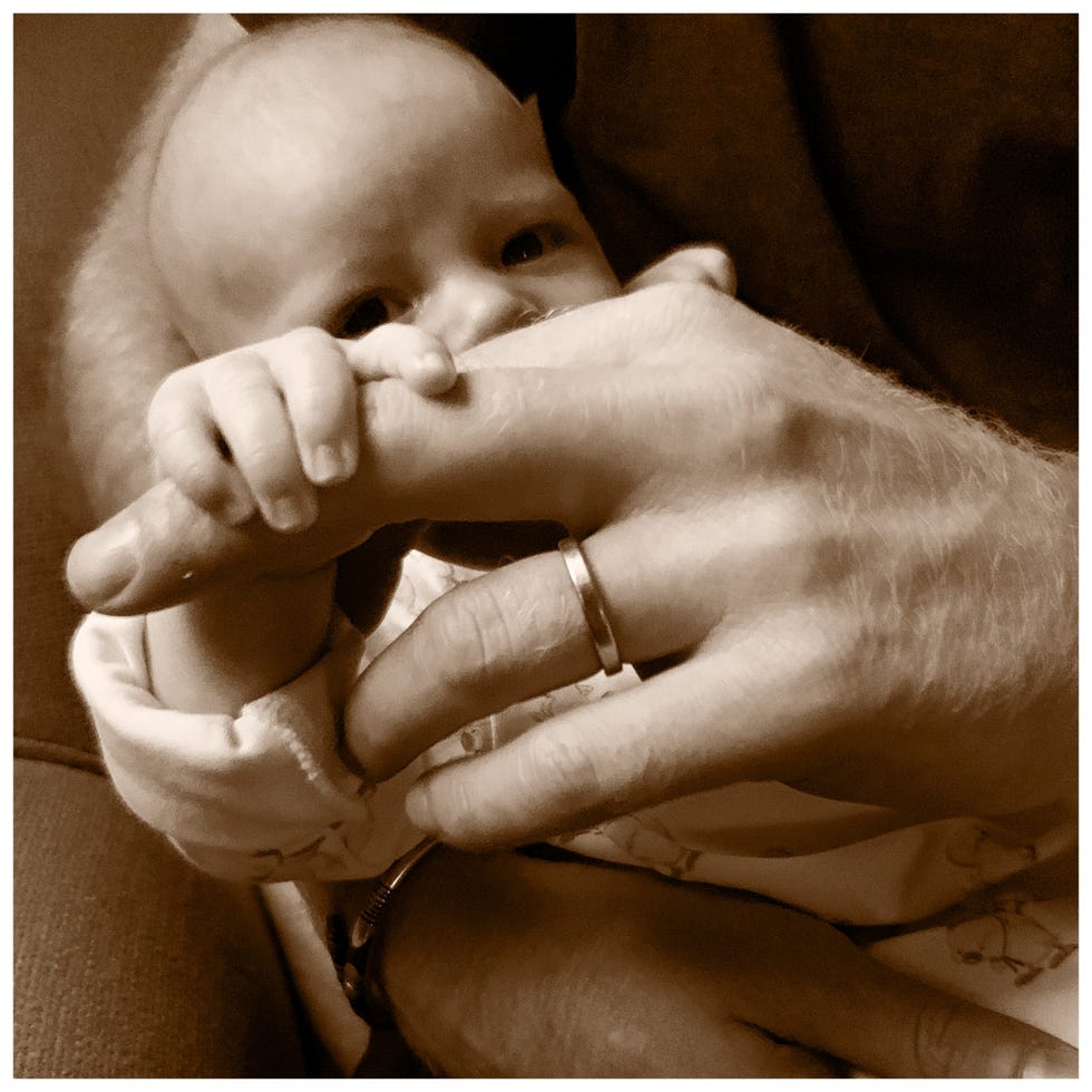 Photograph, Child, Finger, Hand, Baby, Nose, Skin, Nail, Cheek, Lip, 