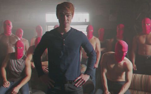 ​Archie (KJ Apa) and members of The Red Circle in Riverdale, Season 2, Episode 3, "The Watcher in the Woods"