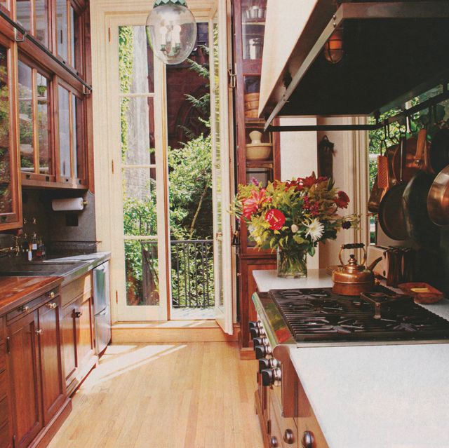 galley kitchen with wood cabinets