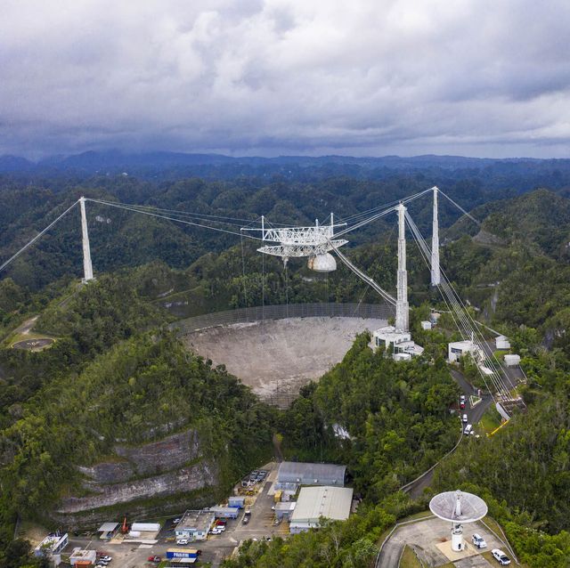 this aerial view shows the arecibo observatory in arecibo, puerto rico on november 19, 2020   the national science foundation nsf announced on november 19, 2020, it will decommission the radio telescope following two cable breaks in recent months which have brought the structure to near collapse photo by ricardo arduengo  afp photo by ricardo arduengoafp via getty images