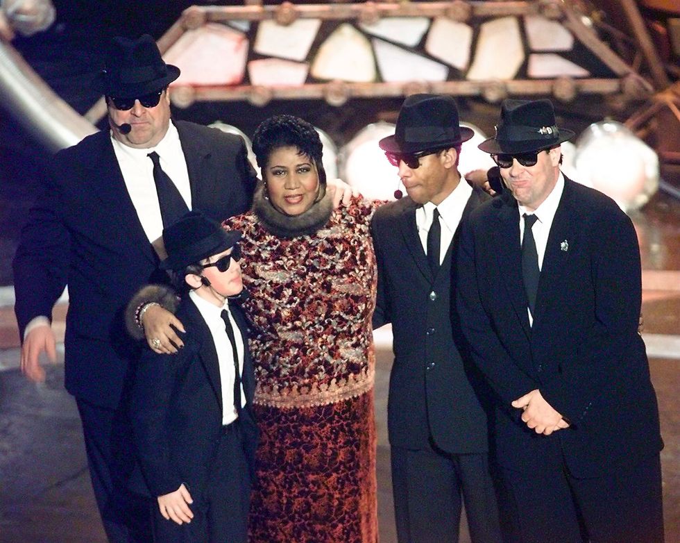 Aretha Franklin poses with the Blues Brothers John