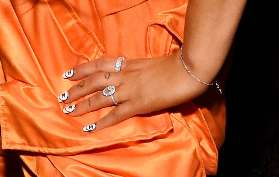 Orange, Nail, Peach, Finger, Hand, Close-up, Ring, Fashion accessory, Jewellery, Nail care, 