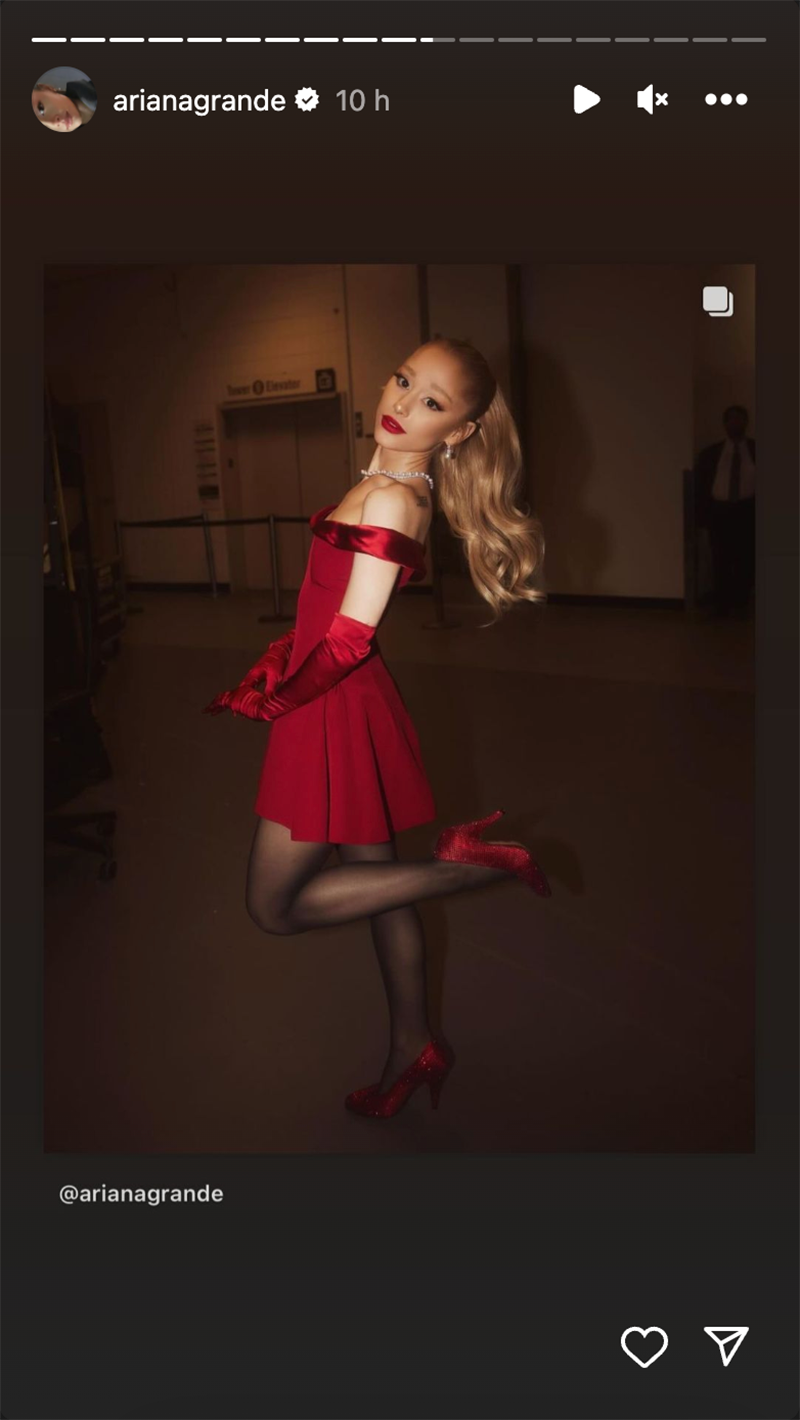ariana grande red dress performance during mariah carey's merry christmas one and all