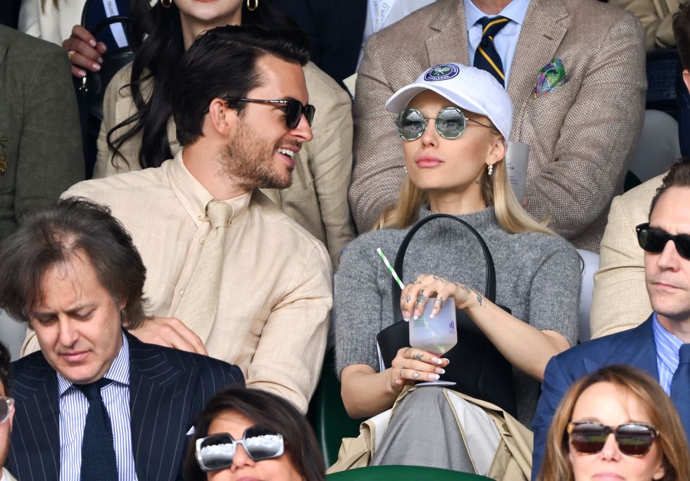 london, england july 16 jonathan bailey and ariana grande watch carlos alcaraz vs novak djokovic in the wimbledon 2023 mens final on centre court during day fourteen of the wimbledon tennis championships at all england lawn tennis and croquet club on july 16, 2023 in london, england photo by karwai tangwireimage