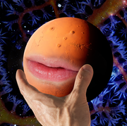 a hand holds up a planet with a pair of lips