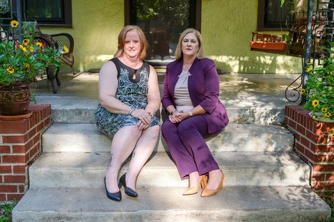 sisters christie and julie burkhart pose for a portait at julie burkhart's home in wichita, kansas on august 28, 2021