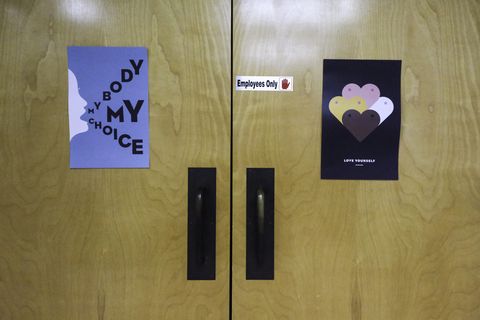 signs adorn the doors that lead to examination and operating rooms at trust women in wichita, kansas