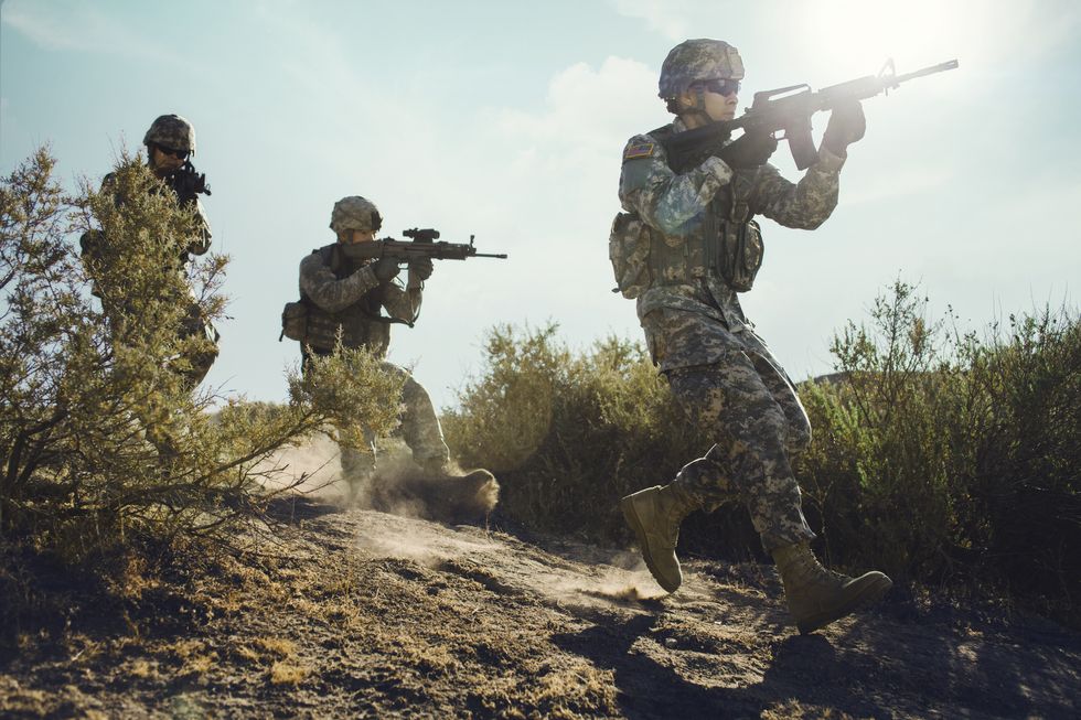 army soldiers advancing in combat