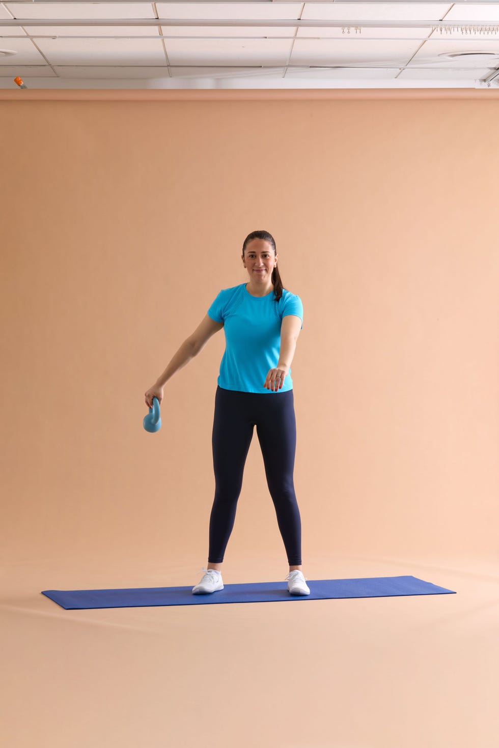 woman doing ab exercises on a yoga mat