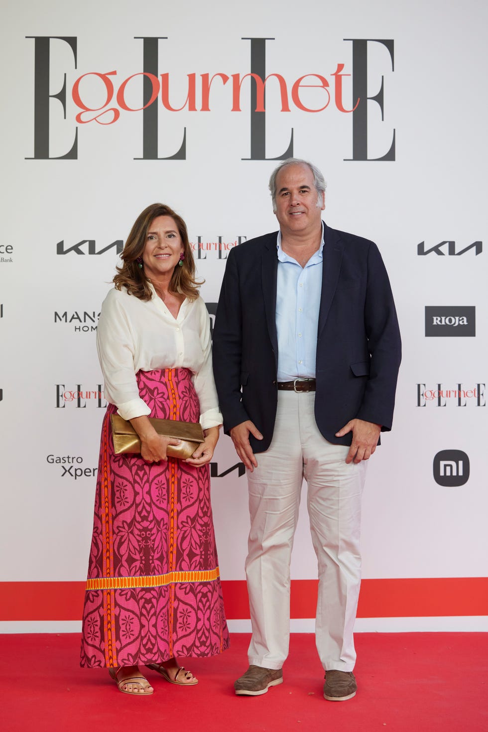 a man and woman posing for a picture