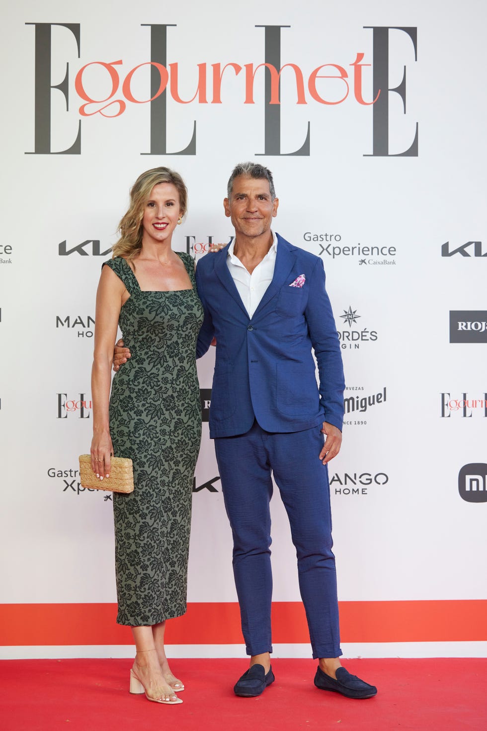 a man and woman posing for a picture