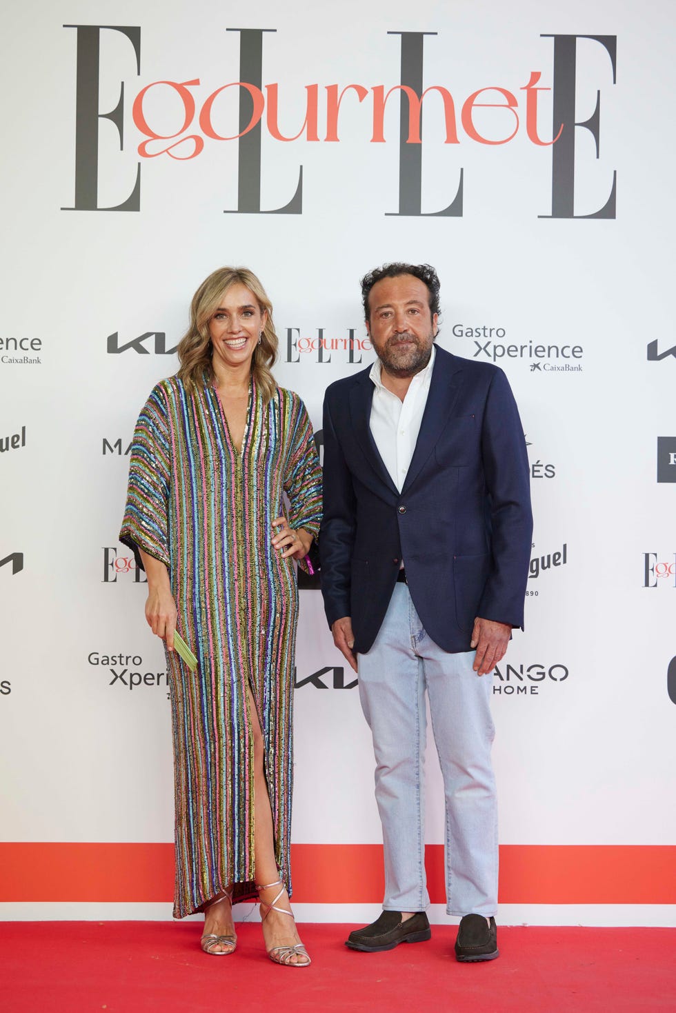 a man and woman posing for a picture