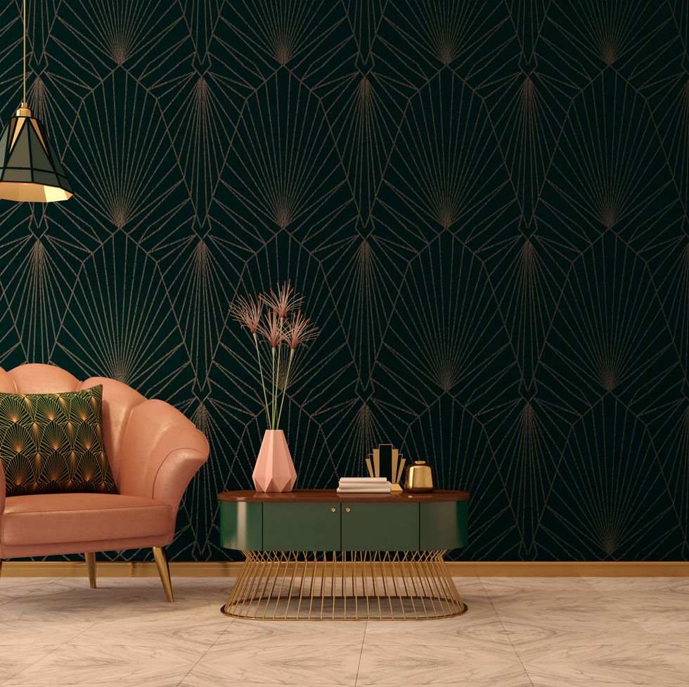 art deco interior in classic style with pink armchair and pillow.vase on table.dark green wall with ceiling lamp.