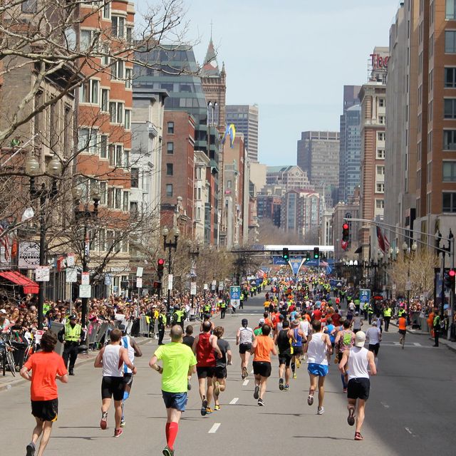 Runners head down Boylston Street toward the Boston Marathon finish line.