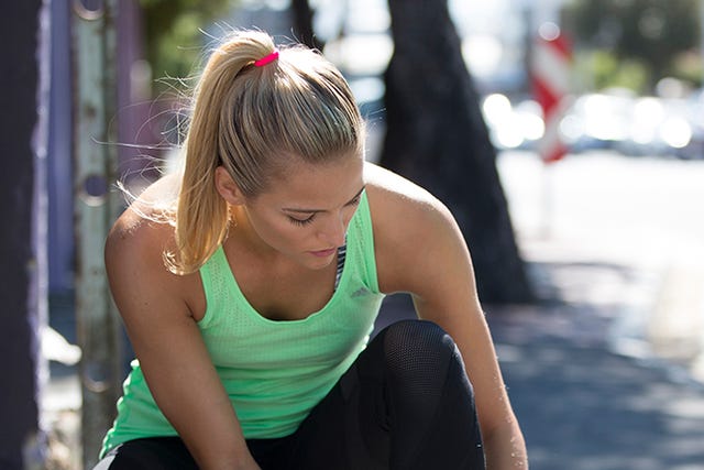 Hairstyle, Shoulder, Elbow, Sitting, Sleeveless shirt, Active tank, Street fashion, Thigh, Long hair, Blond, 
