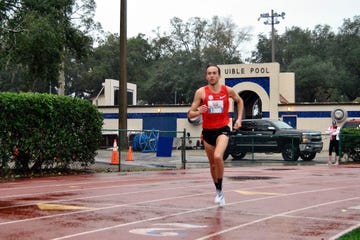 Chris Derrick finishes the Jacksonville Half Marathon. 