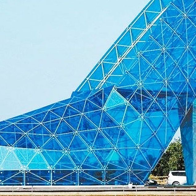 A giant blue shoe that is a church.
