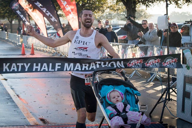 Calum Neff wins the Katy Half Marathon pushing a stroller