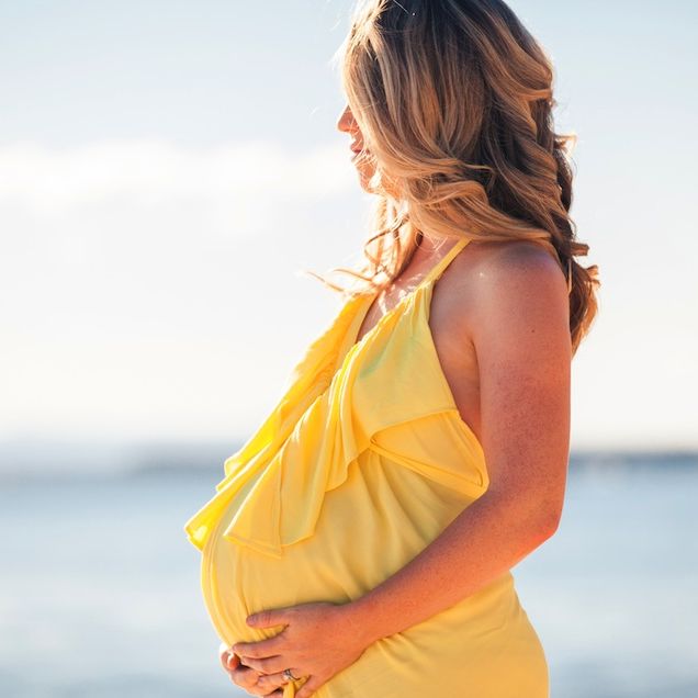 pregnant woman looking into distance