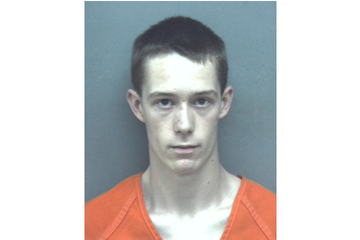 The mugshot of David Eisenhauer, a standout high school runner