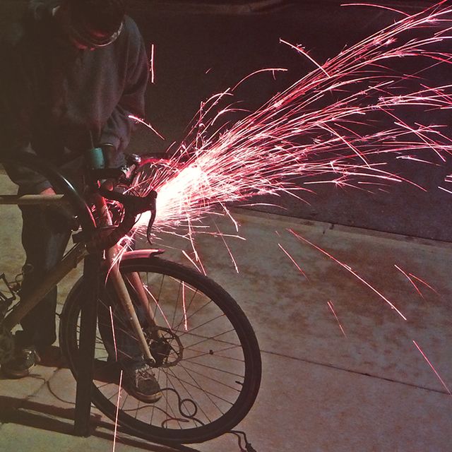 sawing through a u-lock to release a bike