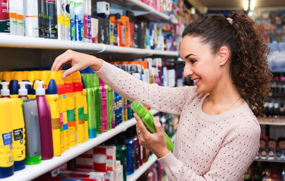 woman shopping for dry shampoo